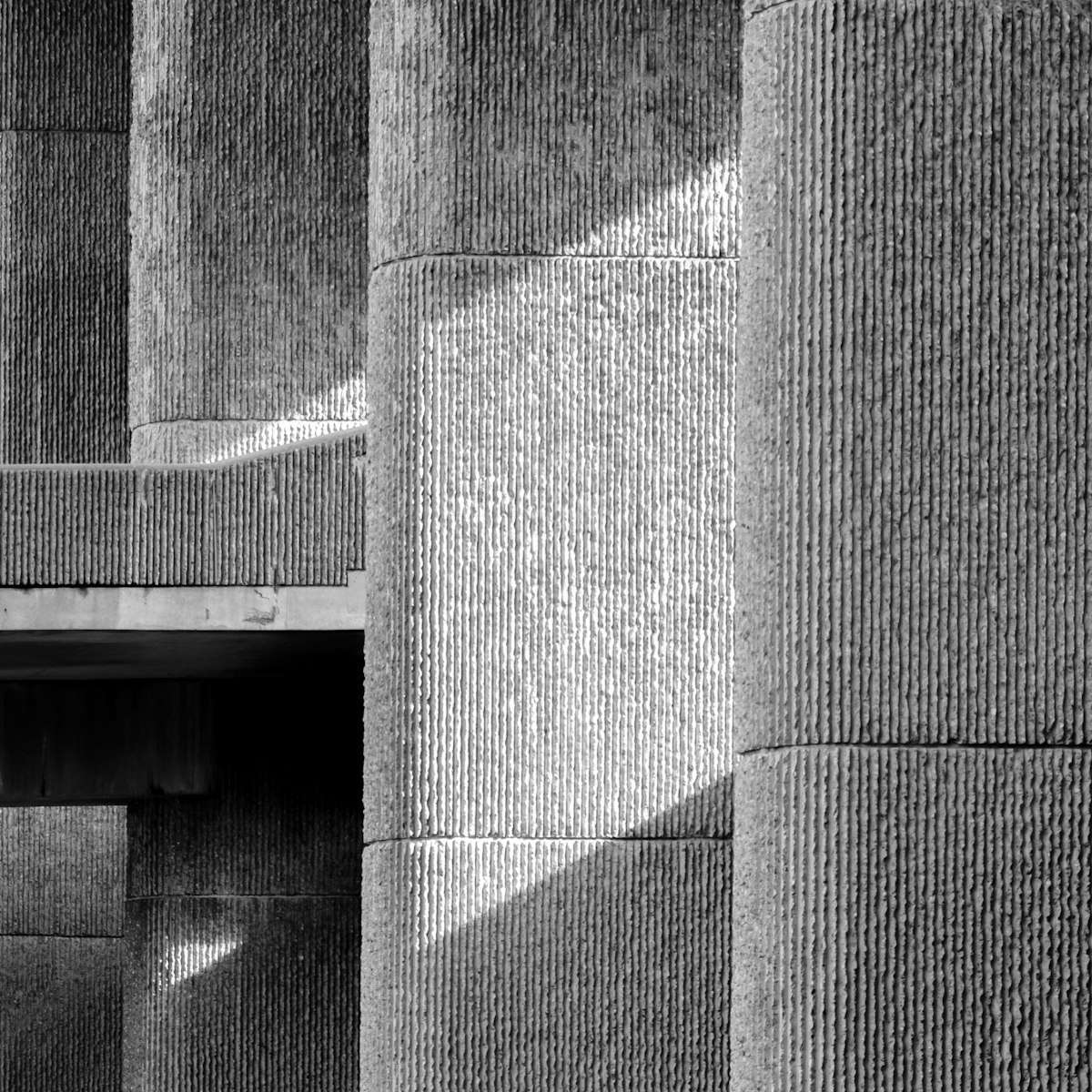 Textured concrete facade in daylight